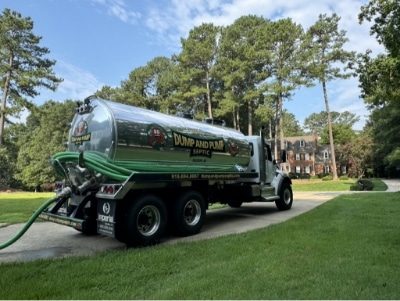 Dump And Pump Truck At House 1 Dump And Pump Truck At House 1